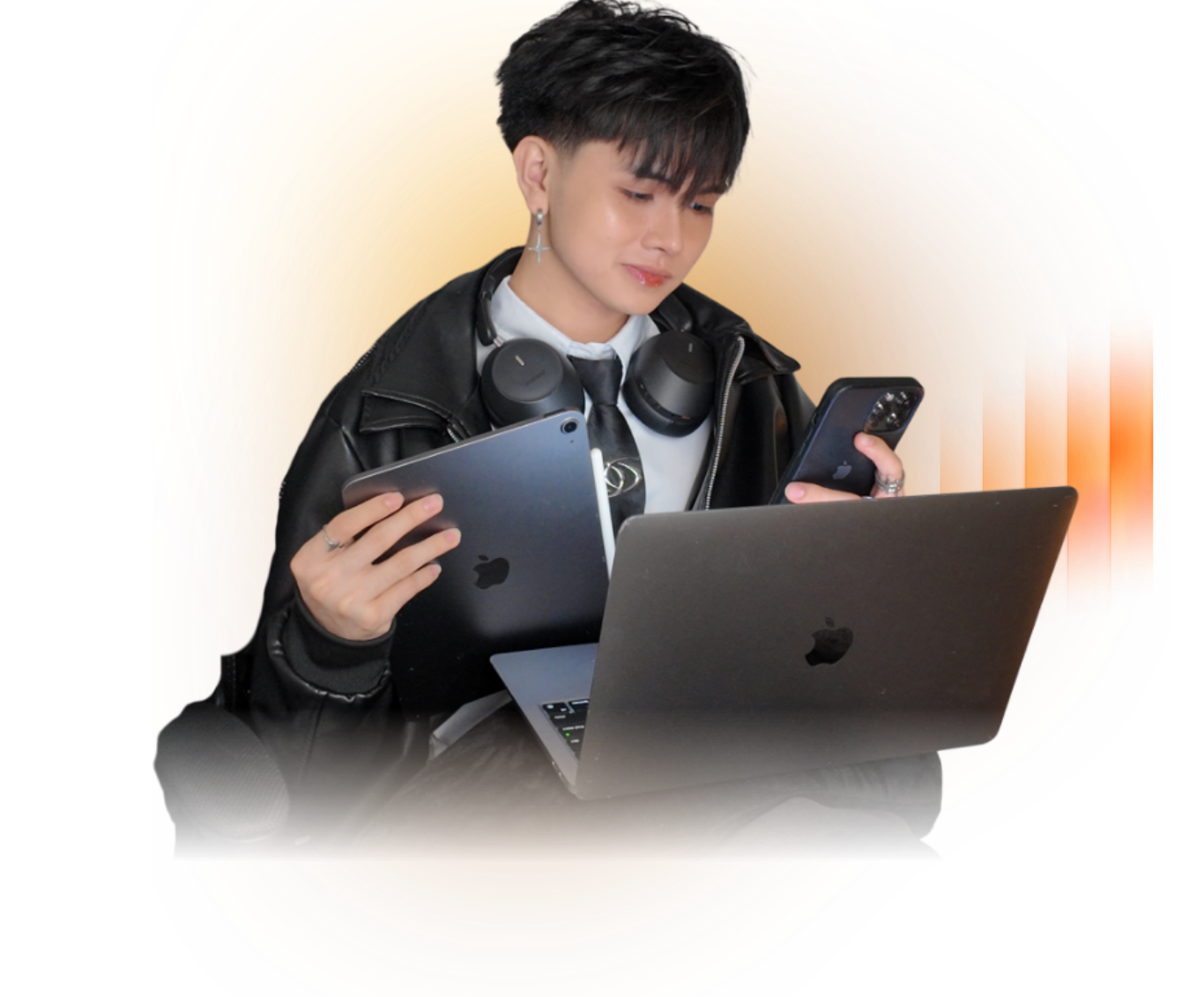 Bryce working across a laptop, tablet, and phone